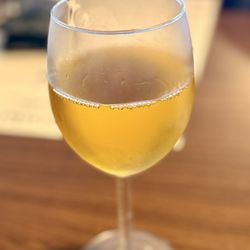 Glass of yummy plum wine which