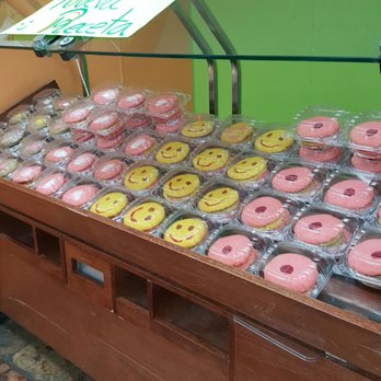 Lux Bakery - a display of doughnuts with smiley faces - Bakeries Near Me - San Antonio, Texas Lux Bakery - a display of doughnuts with smiley faces - Bakeries Near Me - San Antonio, Texas