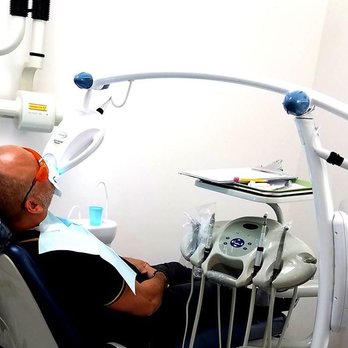A Helena Jimenez, DDS - The winner of our dental whitening contest. He won just in time because he quit smoking so what better way to celebrate! - General Dentistry Near Me - Miami, Florida
