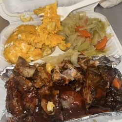 Jerk Chicken, Macaroni and Cheese and Steamed Cabbage/Carrots