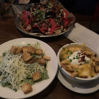 Circle 7 Ranch - Caesar salad, dirty fries, smoked brisket nachos - Salad Near Me - Ballwin, Missouri