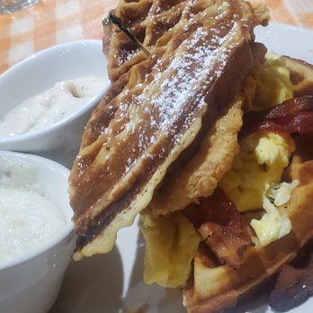 Daisy Mae’s - I had the speciality. Fried chicken egg bacon between two waffle buns sandwich - Breakfast & Brunch Near Me - New Orleans, Louisiana Daisy Mae’s - I had the speciality. Fried chicken egg bacon between two waffle buns sandwich - Breakfast & Brunch Near Me - New Orleans, Louisiana