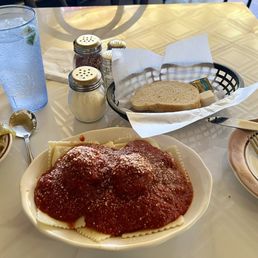 San Pellegrino,, small order of fried hot peppers, cheese ravioli with 2 house made meatballs smothered in that legendary red sauce San Pellegrino,, small order of fried hot peppers, cheese ravioli with 2 house made meatballs smothered in that legendary red sauce