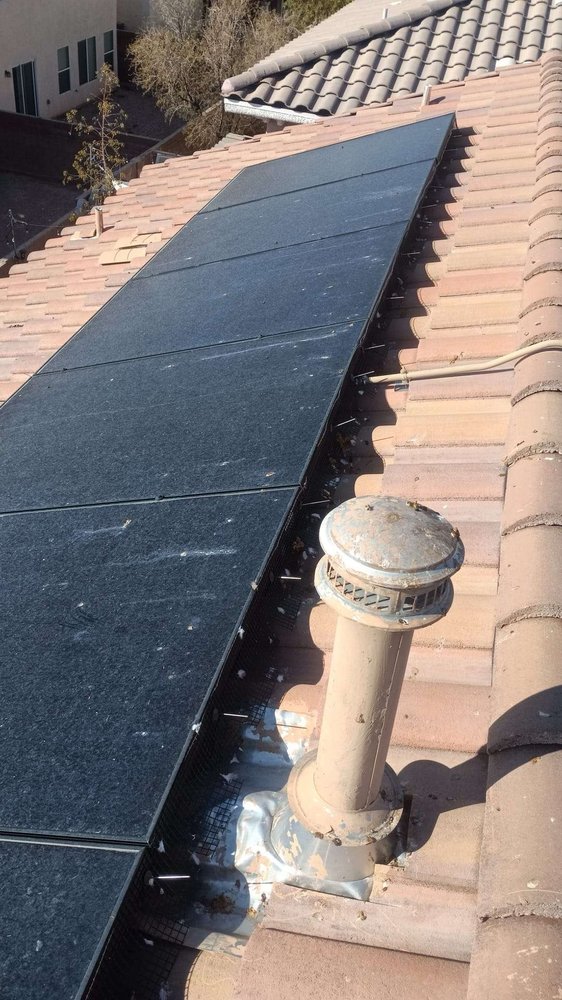 Slide of Tommy´s Roofing