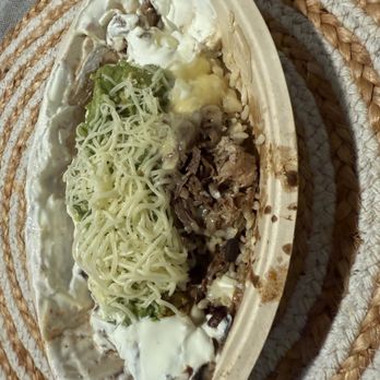 Chipotle Mexican Grill - Carnitas, Barbacoa, brown rice, black beans, cheese, guacamole, queso blanco, & sour cream. - Fast Food Near Me - San Antonio, Texas
