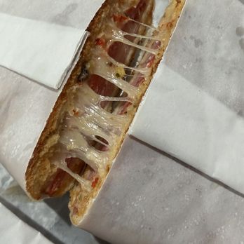 Manor Delicatessen - Cheese pull on Italian Muffaletta Panini - Delis Near Me - Woodhaven, New York Manor Delicatessen - Cheese pull on Italian Muffaletta Panini - Delis Near Me - Woodhaven, New York