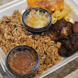 Rice, mac and cheese, and griot