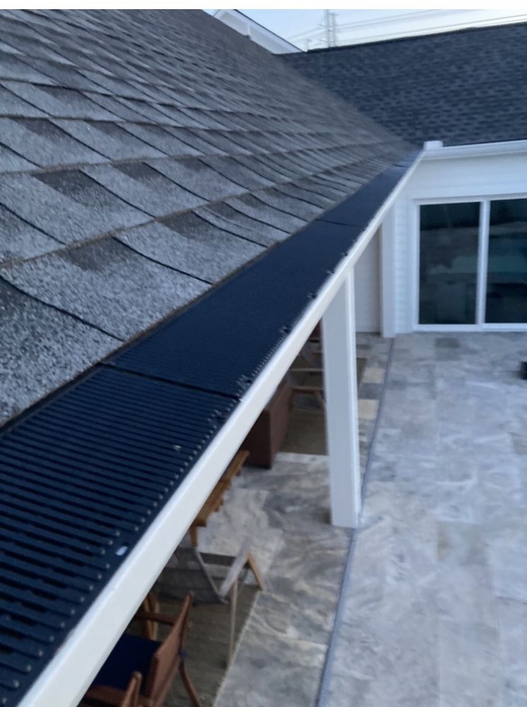 Slide of Gutter Guys Construction