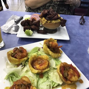 Chimiking Restaurant - Tostones stuffed with shrimp and fried pork chunks with mofongo. - Latin American Near Me - Orlando, Florida Chimiking Restaurant - Tostones stuffed with shrimp and fried pork chunks with mofongo. - Latin American Near Me - Orlando, Florida