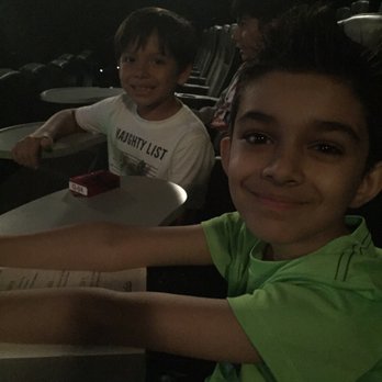 Studio Movie Grill - Surprise movie night out with his best friend - American Near Me - Wheaton, Illinois