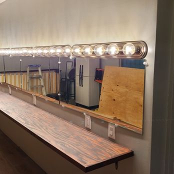 NextGen Handyman - Custom Mirror installation, Countertops mounted and stained. - Handyman Near Me