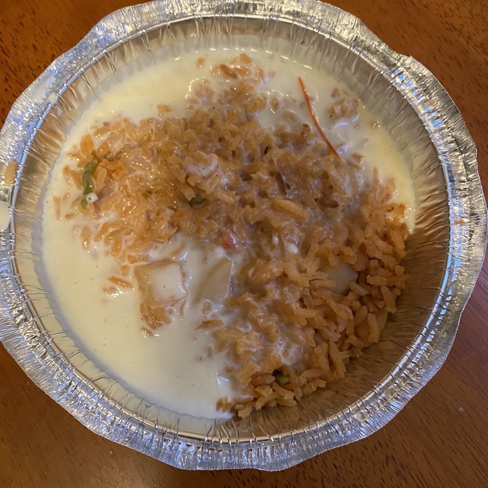 El Agave Mexican Restaurant - Side of rice with cheese sauce - Mexican Near Me - Chattanooga, Tennessee
