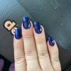 Riverland Nail Spa - Tiny bubbles in the polish, won't pick up with the camera.