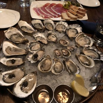 Taylor Shellfish Oyster Bar - 2 dozen oysters, 4 with caviar - Seafood Near Me - Seattle, Washington