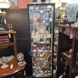 Display case full of English and French acessories