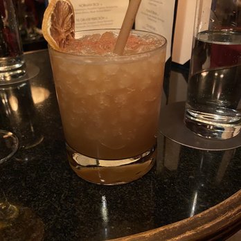 Hell or High Water - a drink with a spoon in it - Cocktail Bars Near Me - Louisville, Kentucky