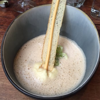 Van der Dussen - Lobster bisque with king crab tail. Rouille with saffron & garlic ending in potato espuma, spring opinion garnish. - Modern European Near Me - Delft, ZH