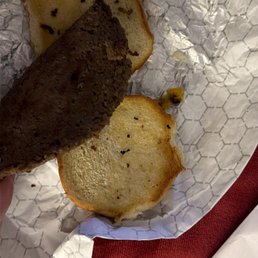 Signature burger - overcooked and missing a second patty and all the fixings.