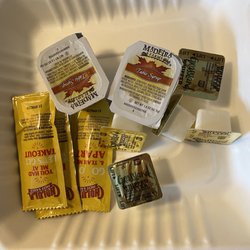 Uptown Diner - Condiments butter, syrup, hot sauce and utensils