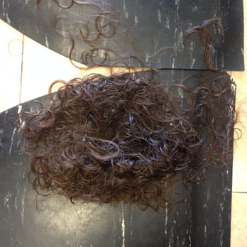 Tiffany Day Spa - Yup that's half of my hair, on the floor!! Looks like a small dog! Pamila did an amazing job chopping it all off. - Nail Salons Near Me - Miami, Florida