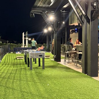 PopStroke - Foosball table, cornhole, connect 4, ping pong  all great things to go before or after you golf. - Mini Golf Near Me - Delray Beach, Florida