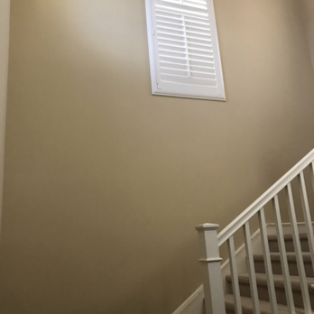 Happy Hour Painting - Stair wall before - Painters Near Me