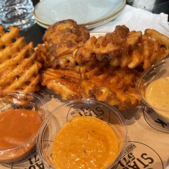 Stack 571 Burger and Whiskey Bar - Waffle fries with a few different dipping sauces - American Near Me - Vancouver, Washington Stack 571 Burger and Whiskey Bar - Waffle fries with a few different dipping sauces - American Near Me - Vancouver, Washington