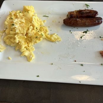 Alexander's Bistro - Out uneaten non-cheesy eggs and super tough sausage. - New American Near Me - Savannah, Georgia