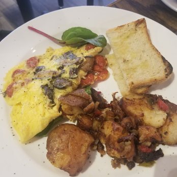 The Franklin - Mushroom and goat cheese omelet with sourdough toast. - Breakfast & Brunch Near Me - Jersey City, New Jersey The Franklin - Mushroom and goat cheese omelet with sourdough toast. - Breakfast & Brunch Near Me - Jersey City, New Jersey