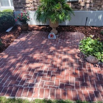 JJ Property Care Services - a brick patio in front of a house - Lawn Services Near Me JJ Property Care Services - a brick patio in front of a house - Lawn Services Near Me