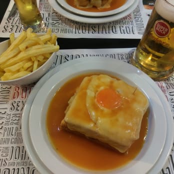 Lado B - Francesinha, before the storm! Extra sauce not pictured, and I haven't dumped the fries in the plate yet - Cafes Near Me - Porto, 13