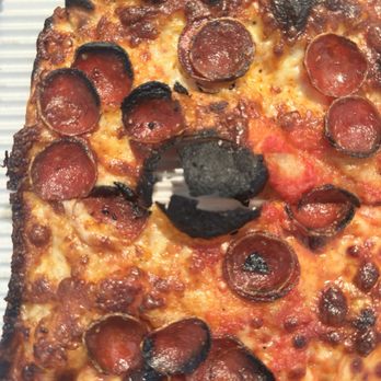Odie's Pizza - Holes in the pizza. - Pizza Near Me - Oceanside, California Odie's Pizza - Holes in the pizza. - Pizza Near Me - Oceanside, California