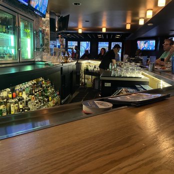 Milwaukee Street Tavern - people sitting at the bar - American Near Me - Denver, Colorado