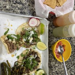 Three tacos and great house salsas and pico.