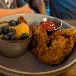 The Farehouse - Fountain Inn - Kids chicken fingers. They are really good! And my French fry hating kid loves that you can get it with fruit instead