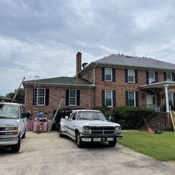JRP Roofing & Remodeling - Roofing a beautiful house on Lake Murray