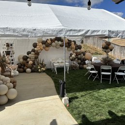 Canopy set up with table and chair rentals