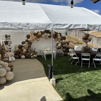 Andrea's Events - Canopy set up with table and chair rentals - Floral Designers Near Me