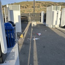 Tesla Supercharger - Raven-ransacked garbage