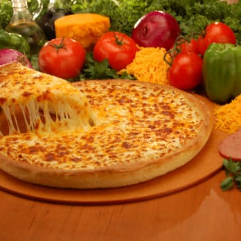 Simple Simon's Pizza - a slice of cheese pizza - Chicken Wings Near Me - Oilton, Oklahoma