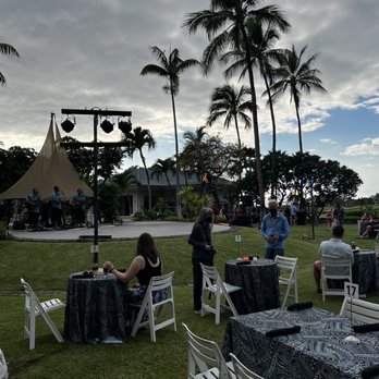 Hawaii Loa Luau - a group of people sitting at tables - Dinner Theater Near Me - Waimea, Hawaii Hawaii Loa Luau - a group of people sitting at tables - Dinner Theater Near Me - Waimea, Hawaii