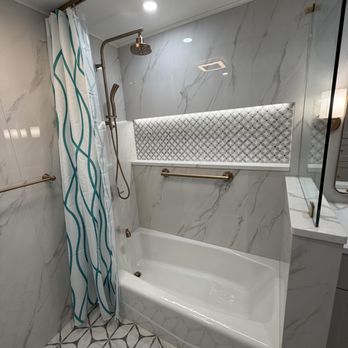 Remodels By Leo - The beautiful new tub-shower combo with a gorgeous shower niche - General Contractors Near Me Remodels By Leo - The beautiful new tub-shower combo with a gorgeous shower niche - General Contractors Near Me