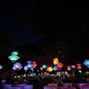 Mad Tea Party - Mad Tea Party with the illuminated lanterns at night. - Amusement Parks Near Me - Anaheim, California