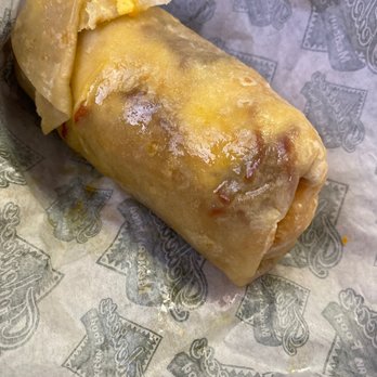 Federico's Mexican Food - Bacon breakfast burrito. So greasy it turned the tortilla transparent, as you can see. - Mexican Near Me - Albuquerque, New Mexico Federico's Mexican Food - Bacon breakfast burrito. So greasy it turned the tortilla transparent, as you can see. - Mexican Near Me - Albuquerque, New Mexico