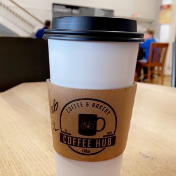 Coffee Hub - a cup of coffee on a table - Coffee & Tea Near Me - Xenia, Ohio Coffee Hub - a cup of coffee on a table - Coffee & Tea Near Me - Xenia, Ohio