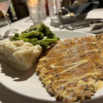 Stoney River - Pecan Crusted trout with the sides. You can see the lemon drop in the back as well. - Steakhouses Near Me - Germantown, Tennessee Stoney River - Pecan Crusted trout with the sides. You can see the lemon drop in the back as well. - Steakhouses Near Me - Germantown, Tennessee
