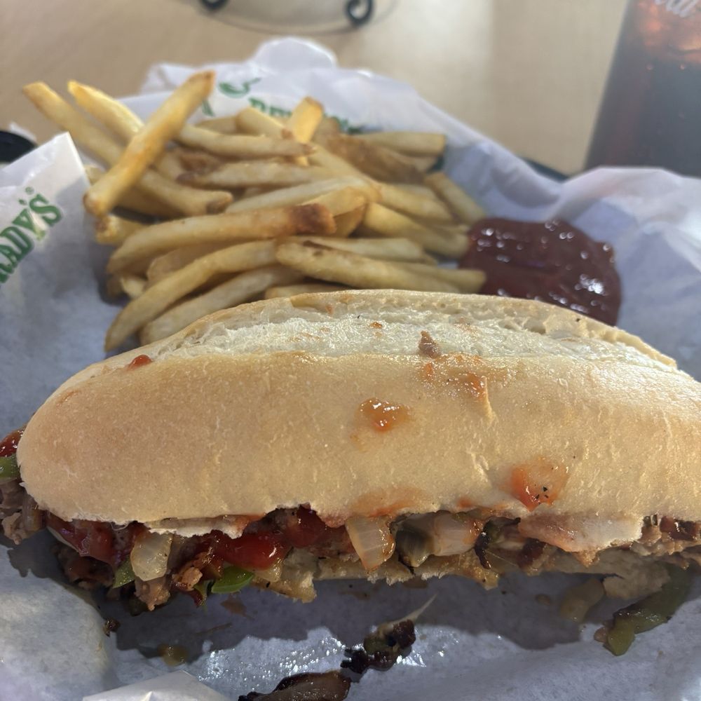 A Philly cheese with sub, plenty of onions and peppers covered in cheese, and I added a little ketchup to bring out the flavors.