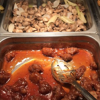 Chopsticks - meat and mushrooms in a buffet - Chinese Near Me - Lake Country, British Columbia Chopsticks - meat and mushrooms in a buffet - Chinese Near Me - Lake Country, British Columbia