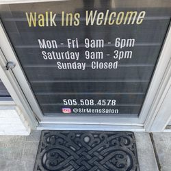 Sir Men’s Salon - 2:30pm pm on a Monday and despite their posted hours, they are closed, of course. Welcome to NM