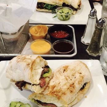 Press 195 - Bayside - Steak with avocado press and a side of cucumbers - Sandwiches Near Me - Bayside, New York Press 195 - Bayside - Steak with avocado press and a side of cucumbers - Sandwiches Near Me - Bayside, New York